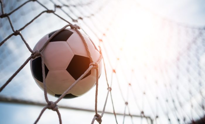 soccer-into-goal-success-concept-min